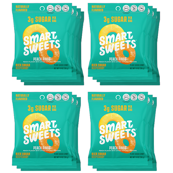 Multiple packages of Smart Sweets peach rings candy on a white background