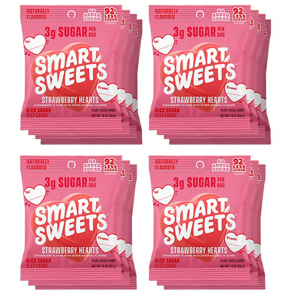 Multiple packages of Smart Sweets Strawberry Hearts candy on a white background