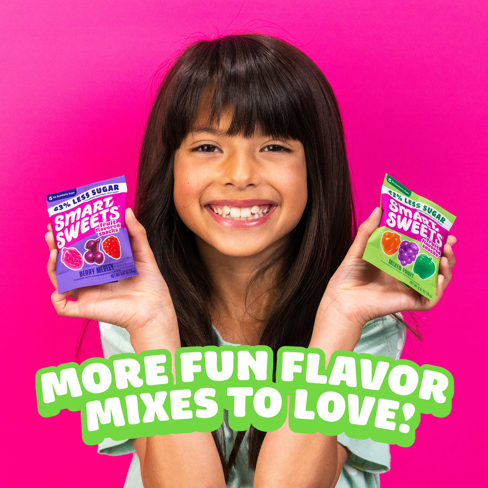 Girl holding snacks. Text: MORE FUN FLAVOR MIXES TO LOVE! 63% LESS SUGAR, BERRY MEDLEY, MIXED FRUIT