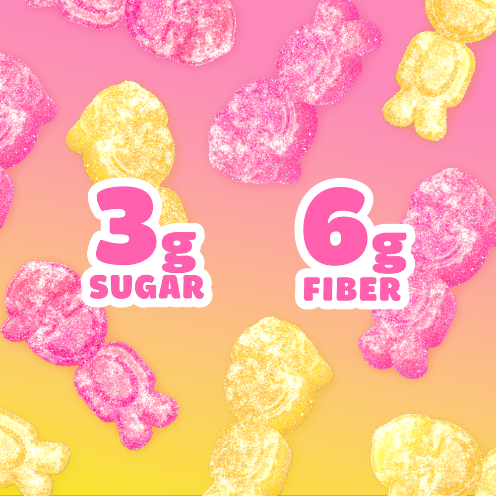 Pink and yellow sour gummy candies on a gradient background. Text overlays read "3g SUGAR" and "6g FIBER".